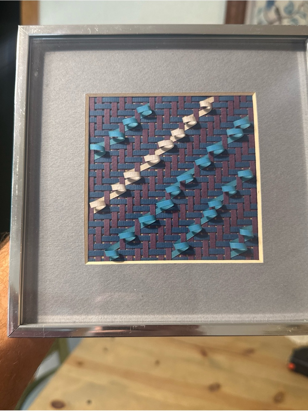 Vintage framed geometric textile or paper ribbon weaving art By Betty Ladd 1982
